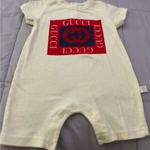 Gucci Infant Cream Onesie with Red and Blue Accents